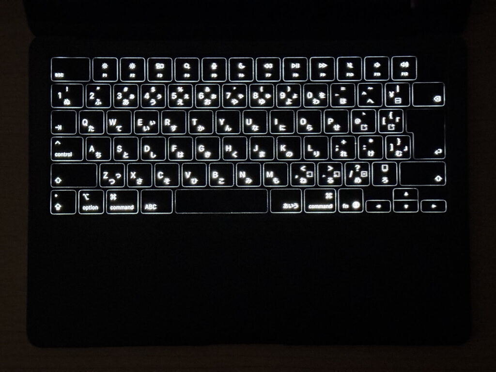 MacBook Air M4 backlit keyboard in low light